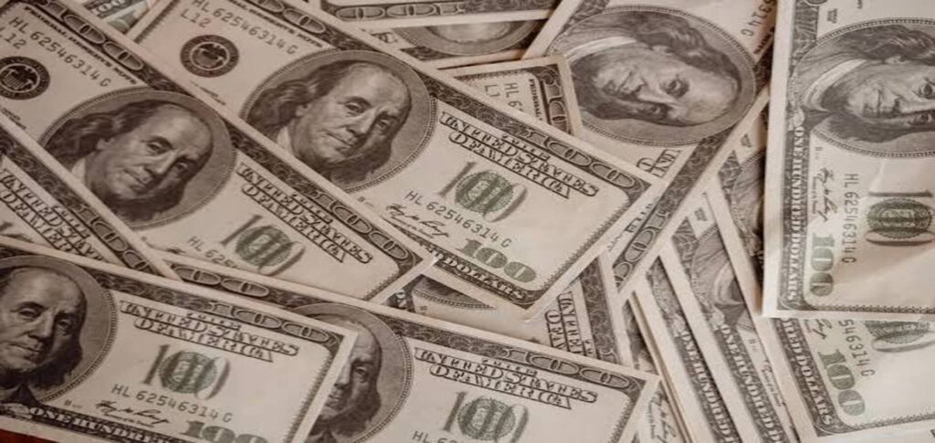 Dollar trading near multi-month lows as bond market debt concerns weigh on investors.