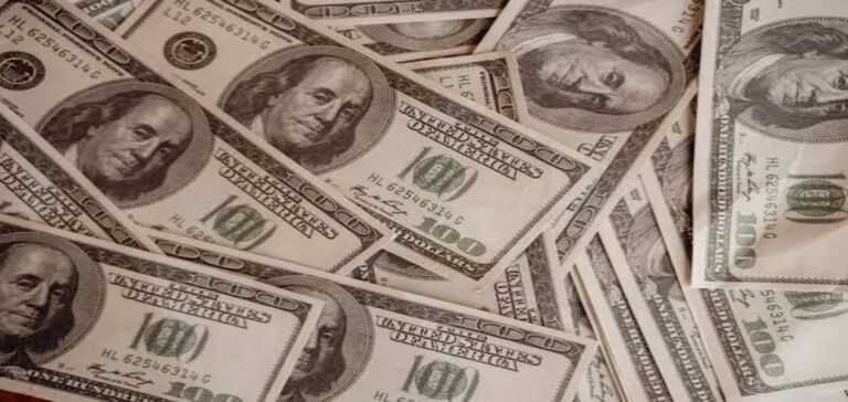 Dollar trading near multi-month lows as bond market debt concerns weigh on investors.