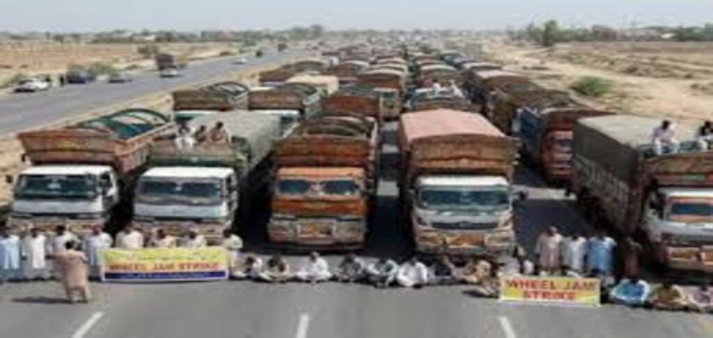 Cargo trucks parked during the nationwide goods transporters strike in Pakistan after transport associations confirmed an indefinite protest over fuel prices and taxes.