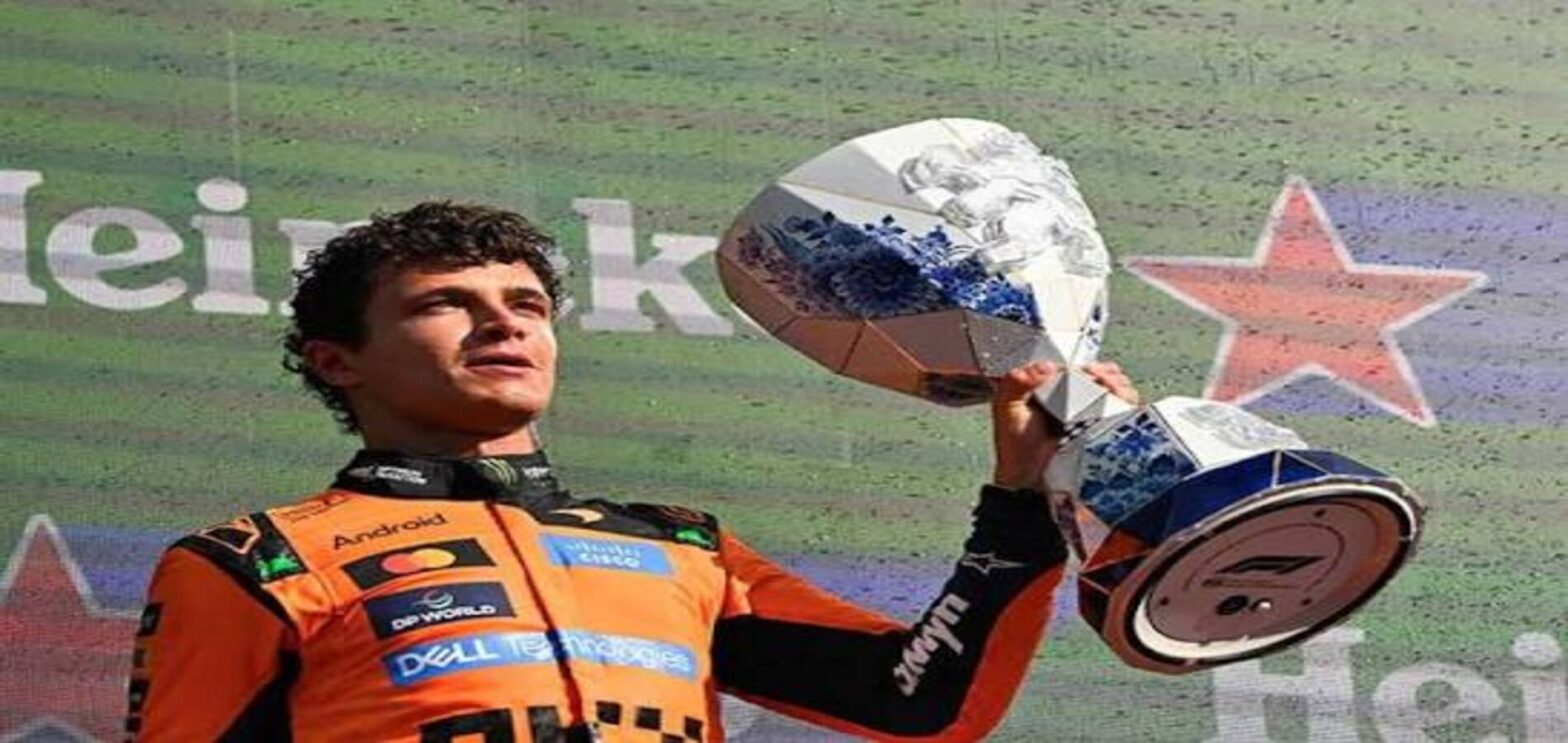 Lando Norris celebrates after extending his McLaren contract until 2030