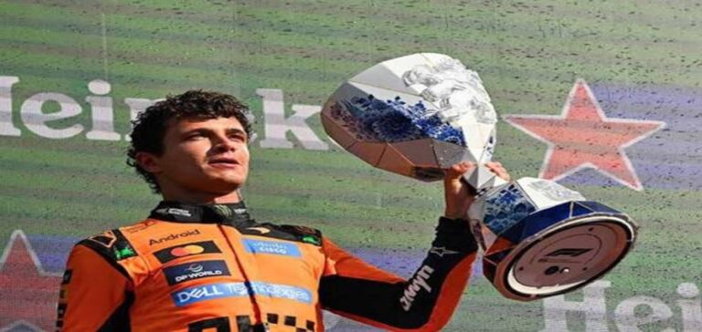 Lando Norris celebrates after extending his McLaren contract until 2030