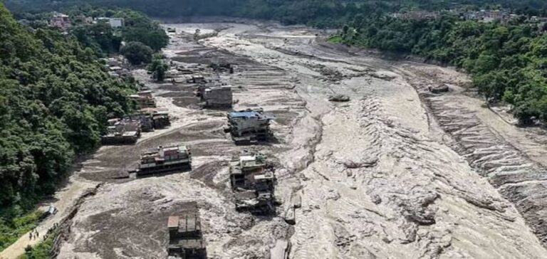 Rescue teams search for missing British tourists after Nepal floods