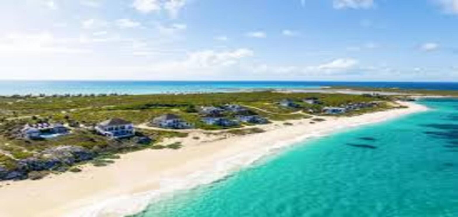 Ambergris Cay Private Island Resort surrounded by turquoise Caribbean waters