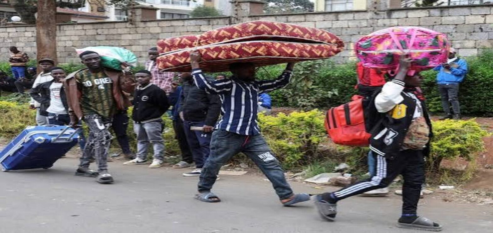 Burundians queue outside their embassy in Nairobi amid fears of a crackdown in Kenya