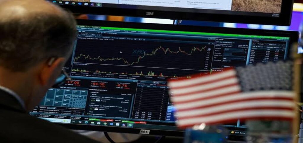 Wall Street traders react to a strong US jobs report and Fed rate hike expectations